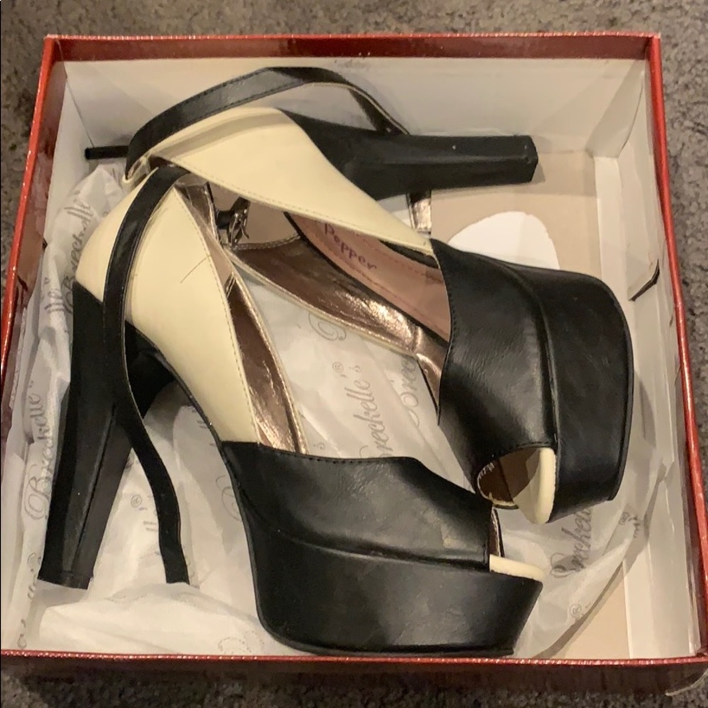 Black and cream heels with peep toe